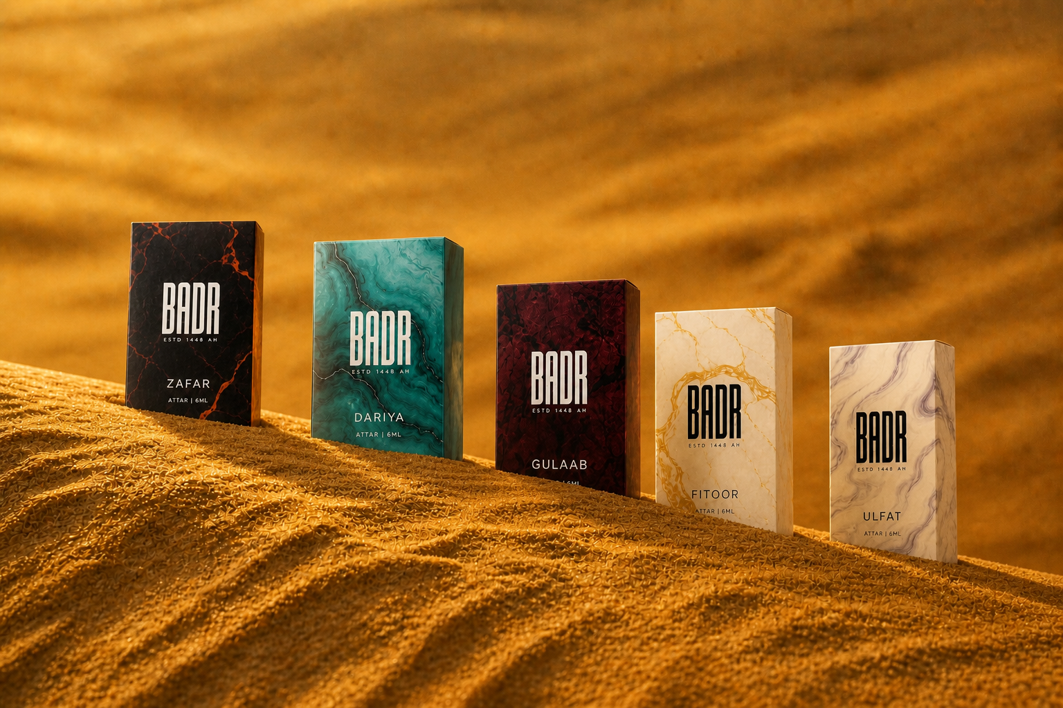 The five BADR boxes emerging from a wind-shaped golden dune